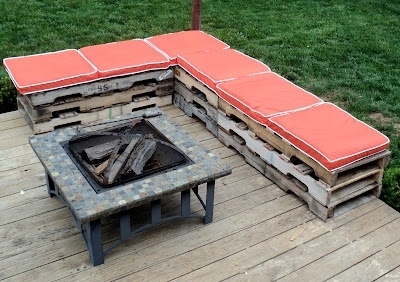 A wooden pallet sectional is easy to put together and provides lots of extra seating for outdoor parties.