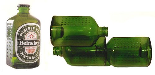The WOBO or world bottle, is basically a brick that holds beer. It was invented by beer brewer Alfred Heineken and Dutch architect John Habraken in 1963 after Heineken's visit to the Caribbean. The design was a great way to address both recycling issues and housing challenges that the country was facing at the time.
