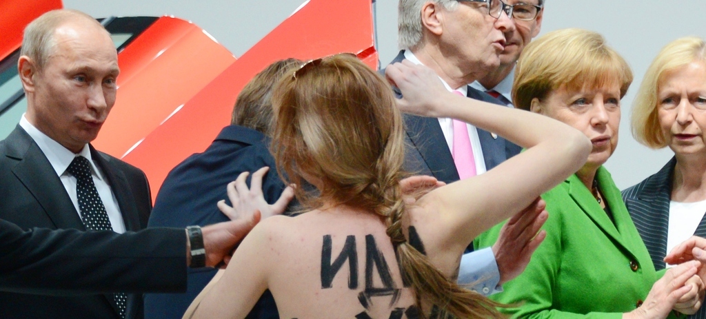 The women were thought to be members of the feminist group Femen, who have protested Putin before.