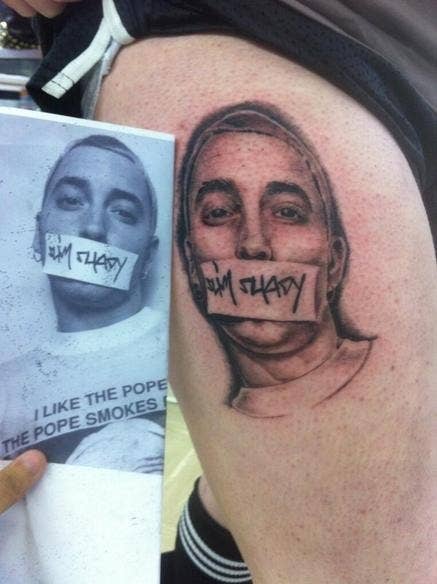 Eminem Backwards E Tattoo Eminem stan breaks guinness world record with 15 portrait tattoos of slim shady. eminem backwards e tattoo