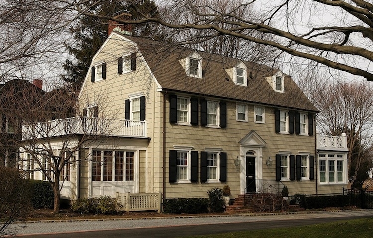 Lastly, to round out our iconic horror movie filming locations, we have the actual house from The Amityville Horror. This horror classic was based on a real-life horrific episode in which a man murdered his whole family then killed himself. About a year after the murders, the Lutz family moved in and experienced paranormal phenomena for about a month until they moved out of the home.