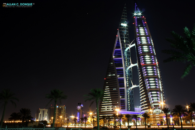 Bahrain World Trader Center - Manama, BahrainAt 787 ft tall, the Bahrain WTC resides in the tiny island Kingdom of Bahrain off the Persian Gulf. These sleek dual towers are propelling architecture into the future, being the first skyscrapers in the world to integrate wind turbines into their build design.