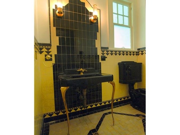 The great mob boss was found dead in one of the bathrooms from a heart attack.