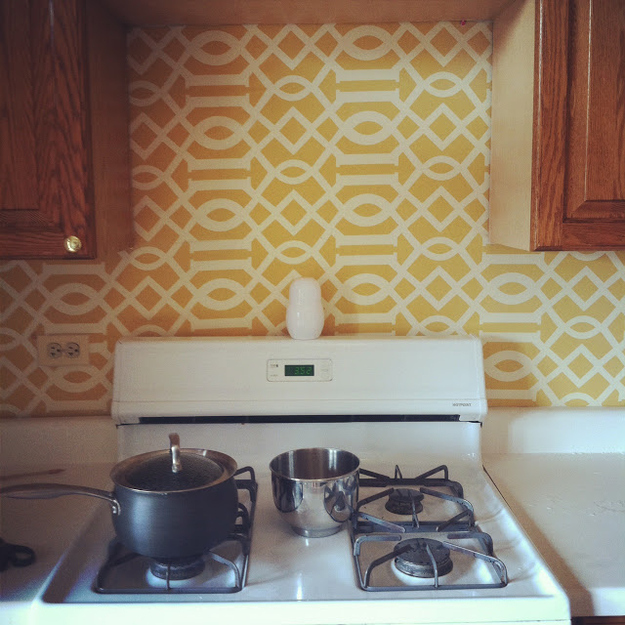 Dorm-friendly wallpaper exists! There is a DIY God! Using fabric and some starch, you can cover those blank walls with the pattern of your choosing, and then peel it off before you leave.