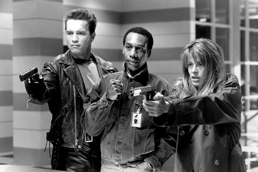 Arnold and Linda need guns...The mayor of Eureka (Joe Morton) needs only his fist.