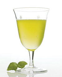Muddled basil leaves topped with ice, Lillet Blanc, gin, and simple syrup strained into a glass blends unique flavors that will liven up any summertime meal outdoors ( a great drink paired with seafood dishes).