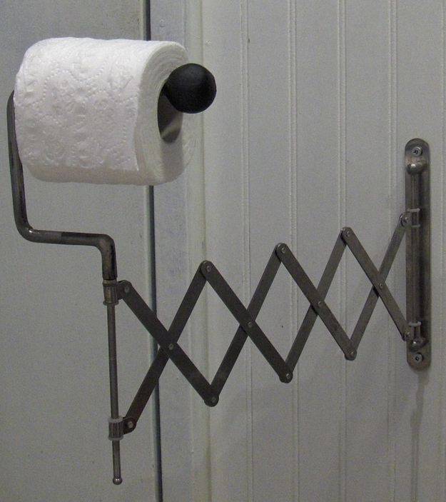 You'll have to hack a Fräck mirror from Ikea, but you too can have a TP gadget worthy of the Inspector and Penny and Brain. It sure beats stacking rolls behind the bowl, and there are some bathrooms that are just too weirdly configured for any other options.For those of you with odd toilet configurations: it's okay. You can wall-mount your toilet paper like everyone else with these instructions. You'll just need a Fräck, some Sugru, and some good, old-fashioned screwing.