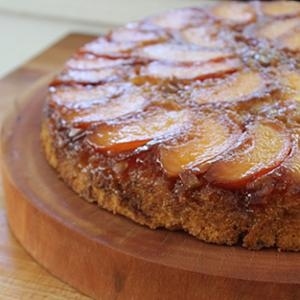 Don't be fooled by the crispy edges of this peach upside-down cake. Inside it's soft, gooey and sweet!