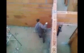 Bet you can't toss a shovel full of mortar like that.