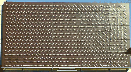 Charles Sowers attached 612 freely rotating directional arrows to illustrate wind patterns.