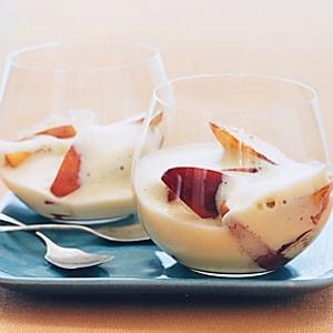 Cover peaches with a foamy, rich sauce of warmed egg yolks whipped with brandy, white wine and sugar for an elegant end to the summer.
