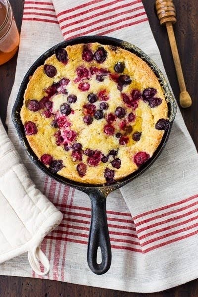 Pour the cornbread batter into a skillet, then top with a layer of heavy cream and honey. Recipe here.