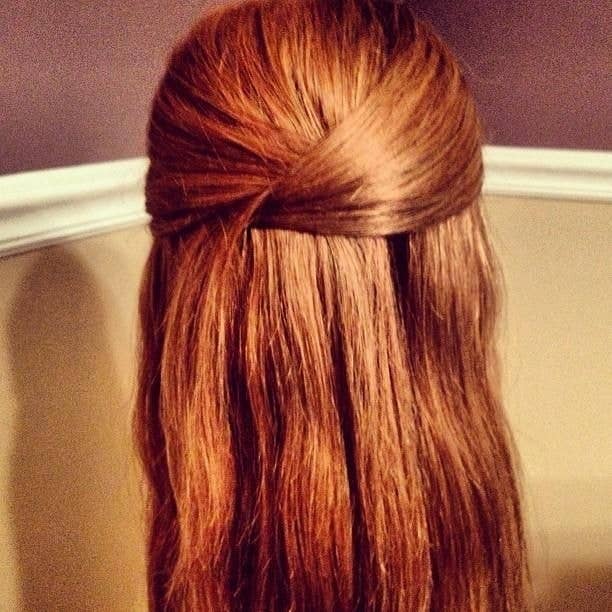 Take a section of hair from the left, pull it to the right, and pin it. Then take a piece from the right and cross it over to the left. Tuck the hair under the piece of hair from the left. Pin it and you are DONE.