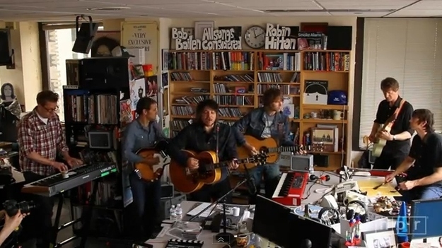 Wilco plays in the NPR office as a part of the Tiny Desk Concert series.