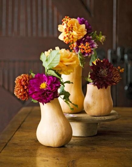 Those are ACTUAL GOURDS being used as vases: