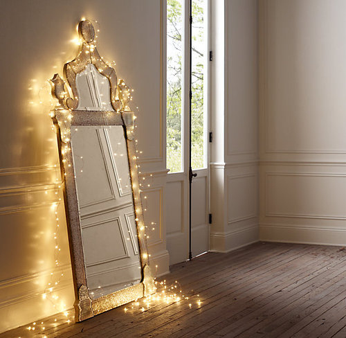 Frame your mirrors with starry string lights.