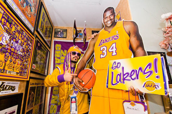 Derek Matthewson, aka Laker Sparrow, is known to have the second largest Lakers memorabilia collection in California. Hes a fun-loving character with a complete passion for the LA Lakers and music. Here is a partial view of a wall filled with 48 autographed basketballs that have been encased and labeled.