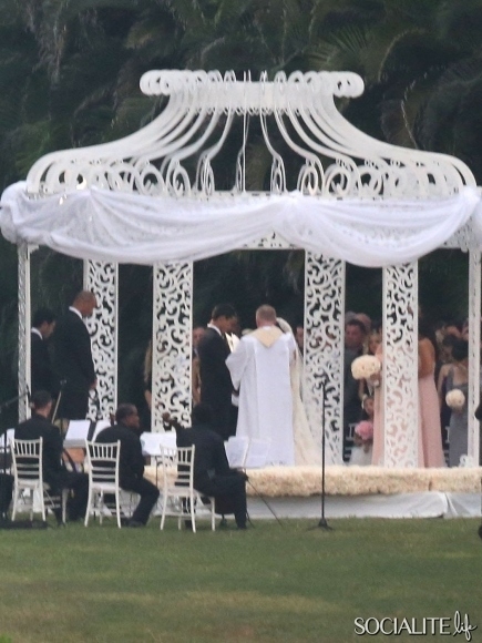 A.C. Slater married Courtney Mazza at his friend, Joe Francis‘ home in Punta Mita, Mexico. Of course they’re friends.E! News reports that a Catholic priest officiated the ceremony at sunset on Saturday (December 1st), and Eva Longoria was a bridesmaid. The couple’s daughter, Gia was a flower girl.Check us out at SocialiteLife.com for more photos!
