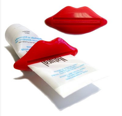 Lip-shaped or otherwise, tube squeezers are only acceptable in cases where the users have two hooks for hands. (And even then it wouldn't work, would it?) In which case I'm really sorry to hear about the accident.