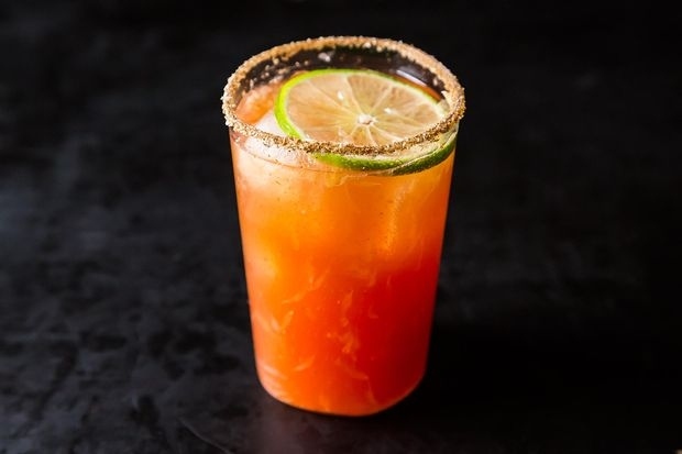 celery salt + tomato juice + limes + Worcestershire + Tabasco + beer . Get the recipe.