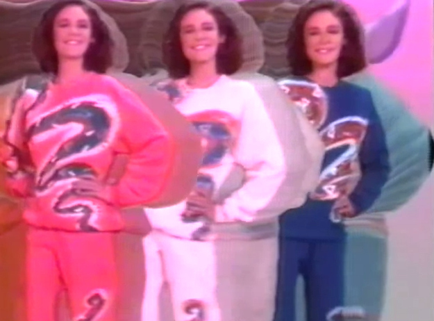 Actually, it's the same lady sashaying around to the moving graphics. After seeing this, I started to think how much work it was to make all these projects in this video! That's a lot of squeezing and brushing!