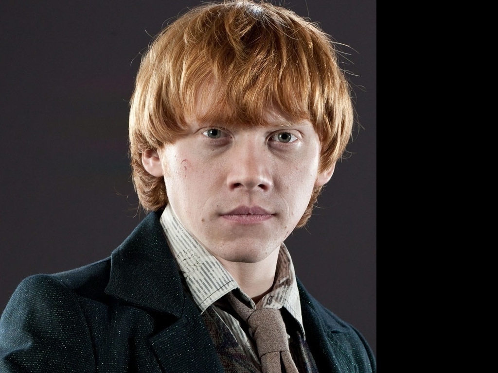 Rupert Grint as Ron Weasley in Harry Potter (2001-2011).