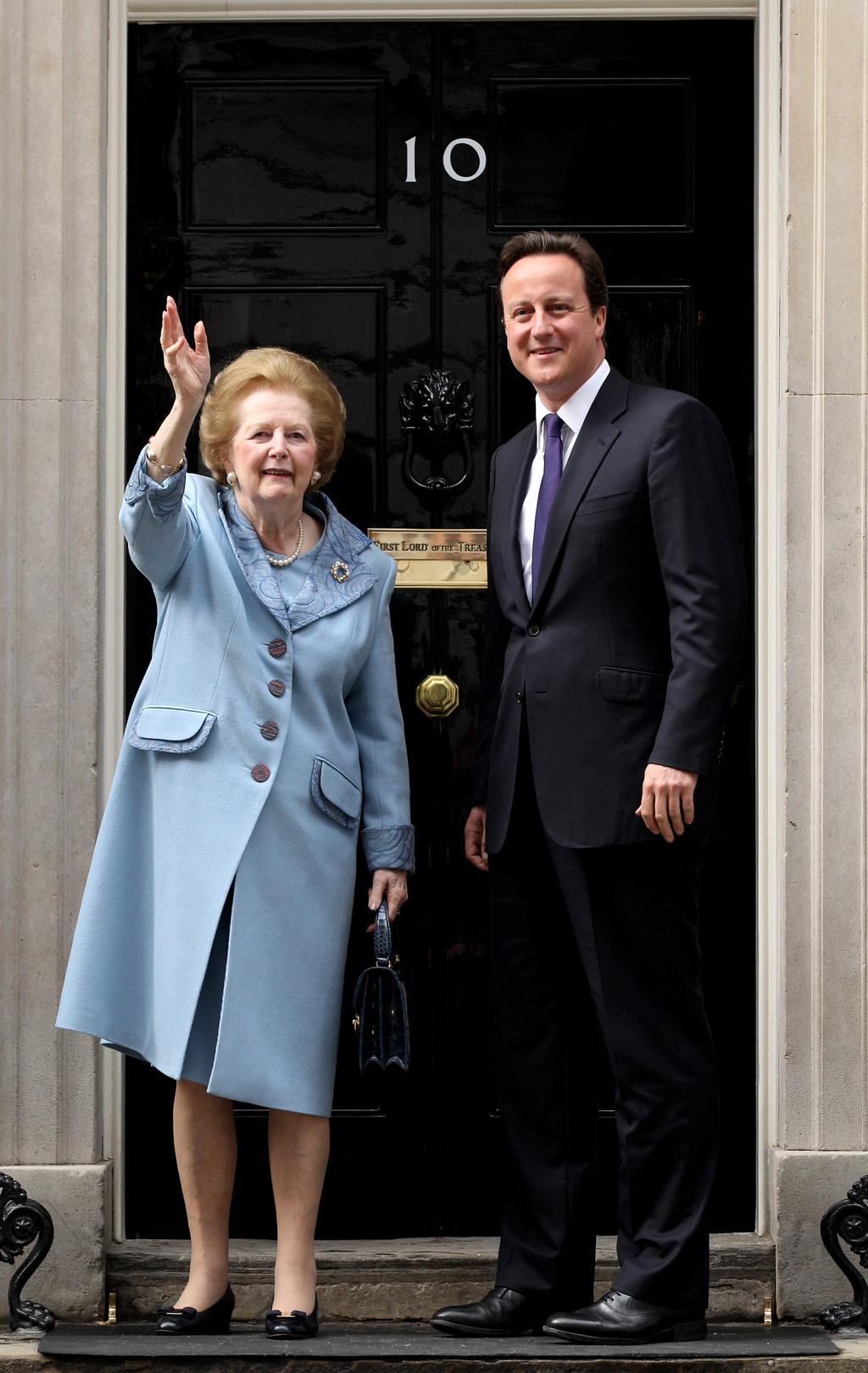 British Prime Minister David Cameron greets Thatcher on the steps of Number 10 Downing Street in June 2010.In October, she would miss her 85th birthday party, to have been hosted in Downing Street by Cameron, because of poor health.