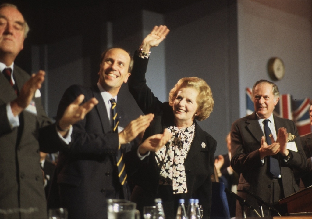 Viscount Whitelaw, Norman Tebbit and Margaret Thatcher at the Conservative Party Conference in Blackpool.In November, Thatcher signs the Anglo-Irish agreement at Hillsborough Castle, ending the violence in Northern Ireland.