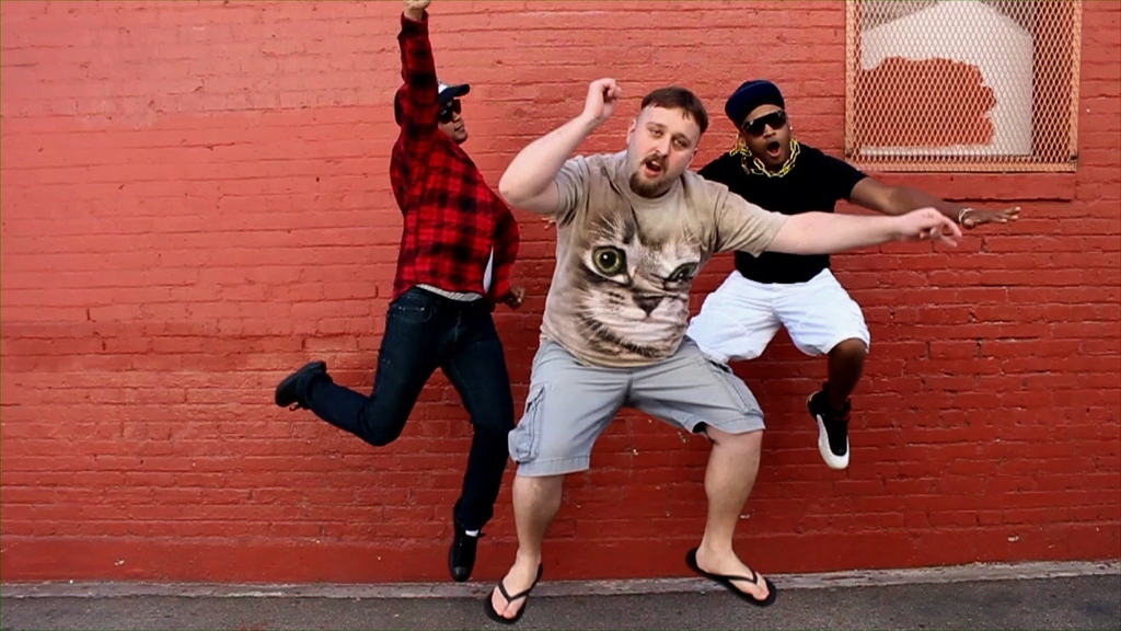 These guys don't really dance, but are featured throughout the video. Perhaps they produced the track? Who knows?