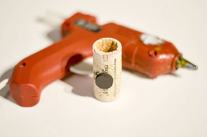 Add soil. Use a 1/4 teaspoon to scoop it into the cork.