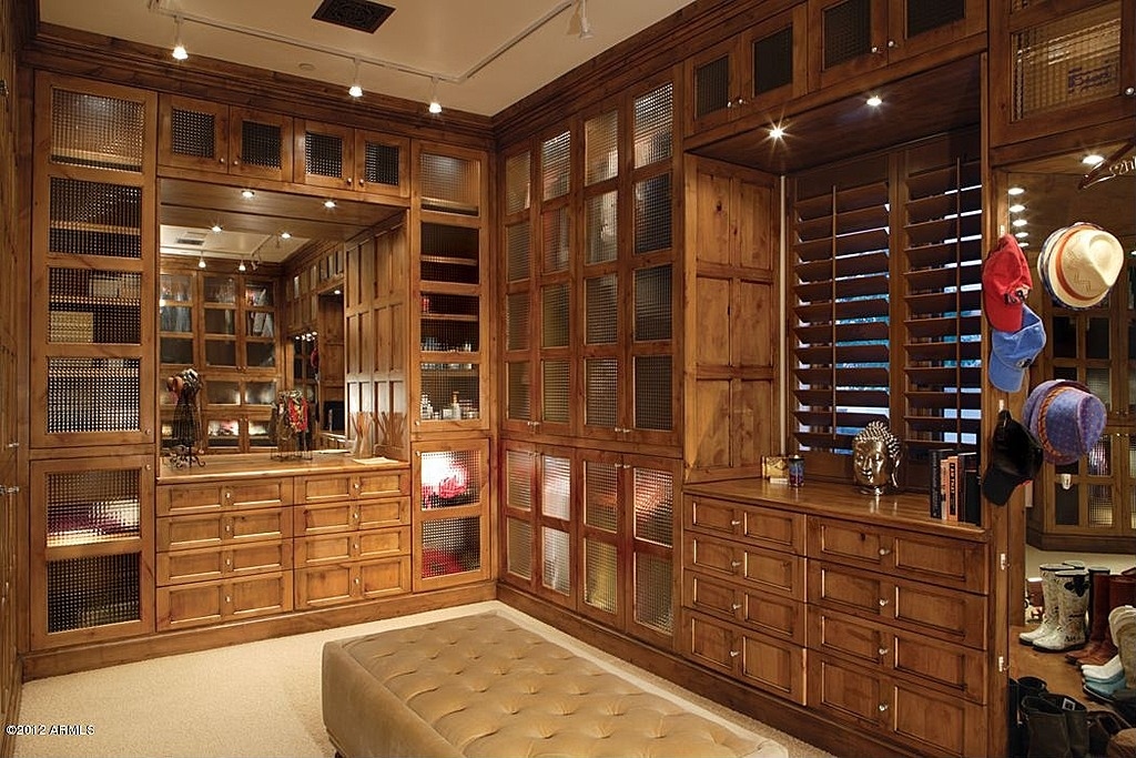 Rich mahogany means a manly closet.