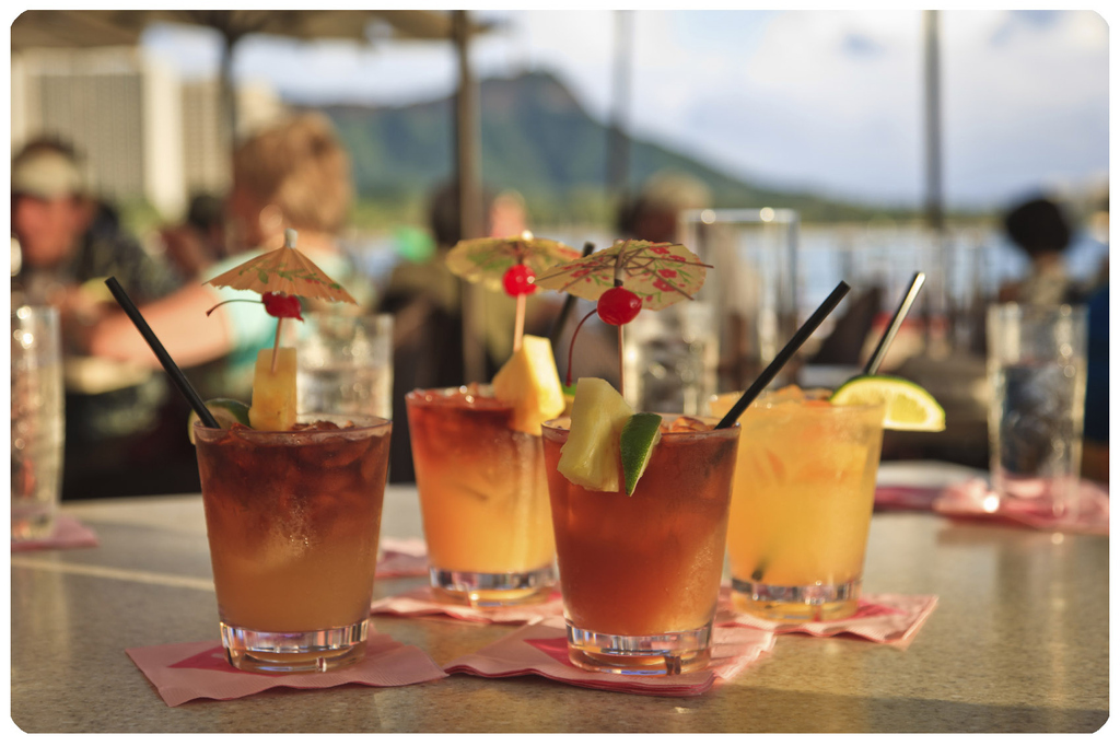 No Luau is complete without the iconic Mai Tai made of fresh tropical juices, dark rum, dressed up with a pineapple wedge and an umbrella! Vic originally created the Mai Tai as a showcase for a 17 year aged rum, with nary a fruit juice in the mix. “The flavor of this great rum wasn't meant to be overpowered with heavy additions of fruit juices and flavorings,” mused Vic, however, his stern statement has since evaporated into the ether much like that of the concept of the original martini. The “proper” Mai Tai recipe has a deep amber hue, resulting from the rums used to concoct the libation and not from any fruit juices or colored sweeteners. Trader Vic’s original aged rum is no longer available, but today’s rums make for perfect rum drinks, including the ubiquitous Trader Vic’s Mai Tai. Get Recipe