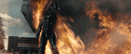 Or is he just whacking that flame away from him?