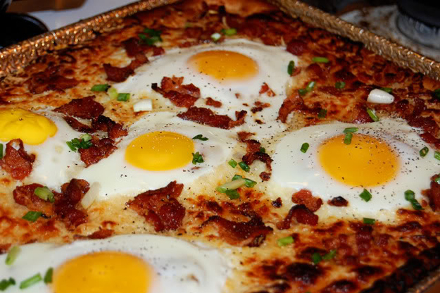 Fresh bacon + fried eggs = breakfast pizza on steroids.
