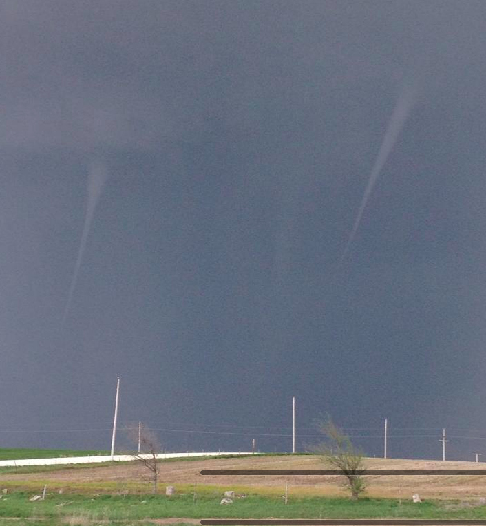 Funnel clouds captured seven miles east of Hays, Kansas.