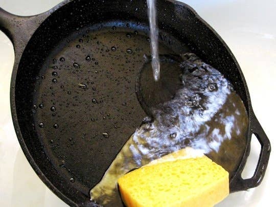 Get directions on how to clean cast-iron cookware. (You can't use soap because it causes them to rust like crazy.)