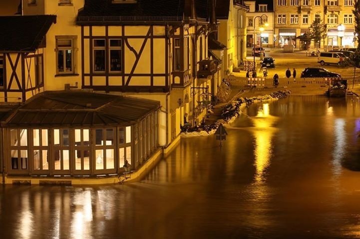 This eerie photo was taken last night. This is one of the oldest restaurant/guest houses in the city. So many people worked hard to try and protect it from flooding. Sadly, as the next photo shows, they were unsuccessful...