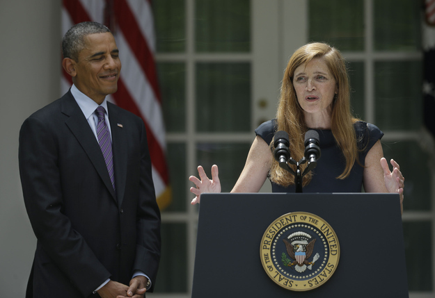 President Barack Obama (left) smiles as he listens to his nominee for United Nations Ambassador Samantha Power (right) speak to members of the media in the Rose Garden of the White House in Washington, D.C., on Wednesday, June 5, 2013.