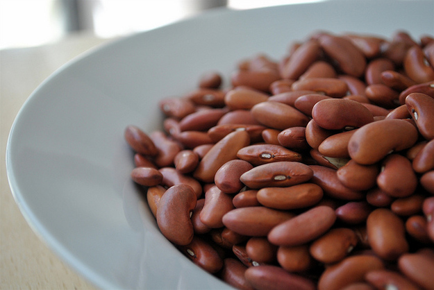 Everyone knows the expression, "Beans, beans the magical fruit; the more you eat the more you toot." It's true. Beans are the original gassy food. They contain certain sugars which are part of the "flatulence factors." The sugar sits in your stomach, then when it reaches your intestines the bacteria go crazy and have a big ol' gas party.
