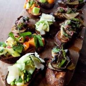 A currant-sherry vinaigrette binds bittersweet peppers with roasted eggplant for the ultimate summer appetizer.