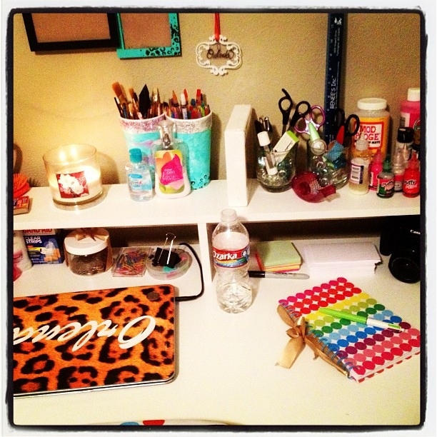 If your desk is welcoming you'll be more inclined to work at it! Decorate frames, add some candles and get colorful notebooks to add fun to an otherwise boring place.