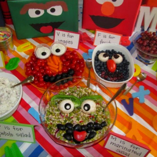No idea what Oscar's marinated salad is made of, but it looks healthilicious. Also of note: Grover.