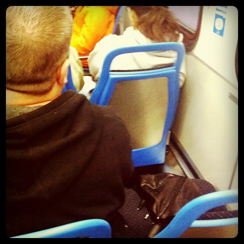 That seat had a warm bum ready to sit in it. But that bum's dream was shattered when it saw the residue left over from its previous seat owner's umbrella. Now it is a slightly damp bum.Bummer.