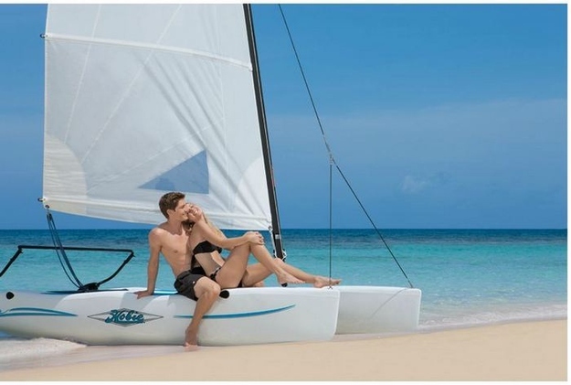 “Oh, you have to pay extra to take the hobie cat out? Let’s just stay onshore then, hun — sitting on it is just as fun!” (Secrets Wild Orchid Montego Bay, Jamaica)