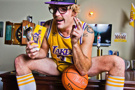 Chris Pouy aka Durt Rambis has made a name for himself at Staples Center as a Lakers superfan. Durt, Kurt Rambiss fictional down and out brother, is a guy that keeps it fun and energetic at games. I dressed as Kurt Rambis for Halloween, two years ago. After a night of dancing and debauchery, I ended up sweaty and filthy at pretty nice restaurant. Someone came in and recognized me from the party and yelled, "Hey, It's Durt Rambis!" and the legend was born.