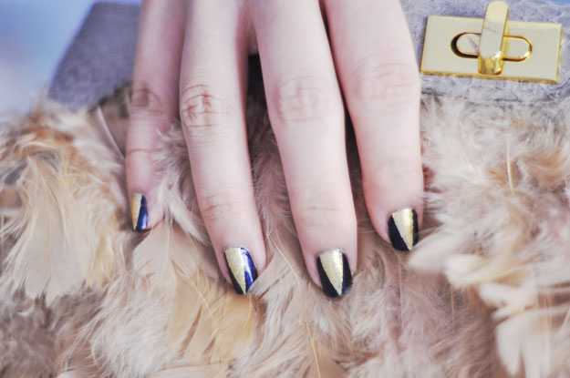 A great look for day-to-night wear. What you'll need: Two nail polishes in contrasting colors (one metallic looks cool), a base coat, a top coat, and tape.