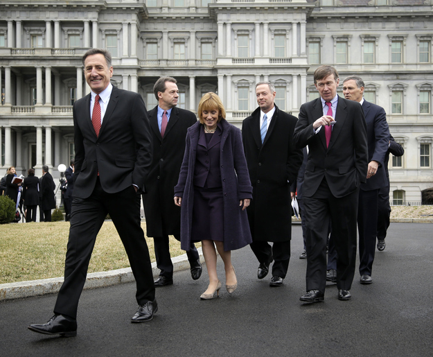 Vermont Gov. Peter Shumlin, left, leads fellow Democratic governors along the White House driveway after a meeting with President Barack Obama last week.