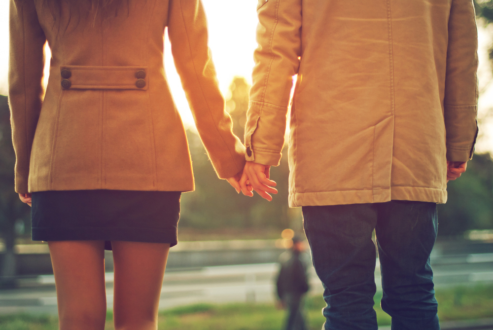 Rub their leg, touch their arm, hold hands. These are all little actions that remind them that you're together, and you still feel that deeper connection.