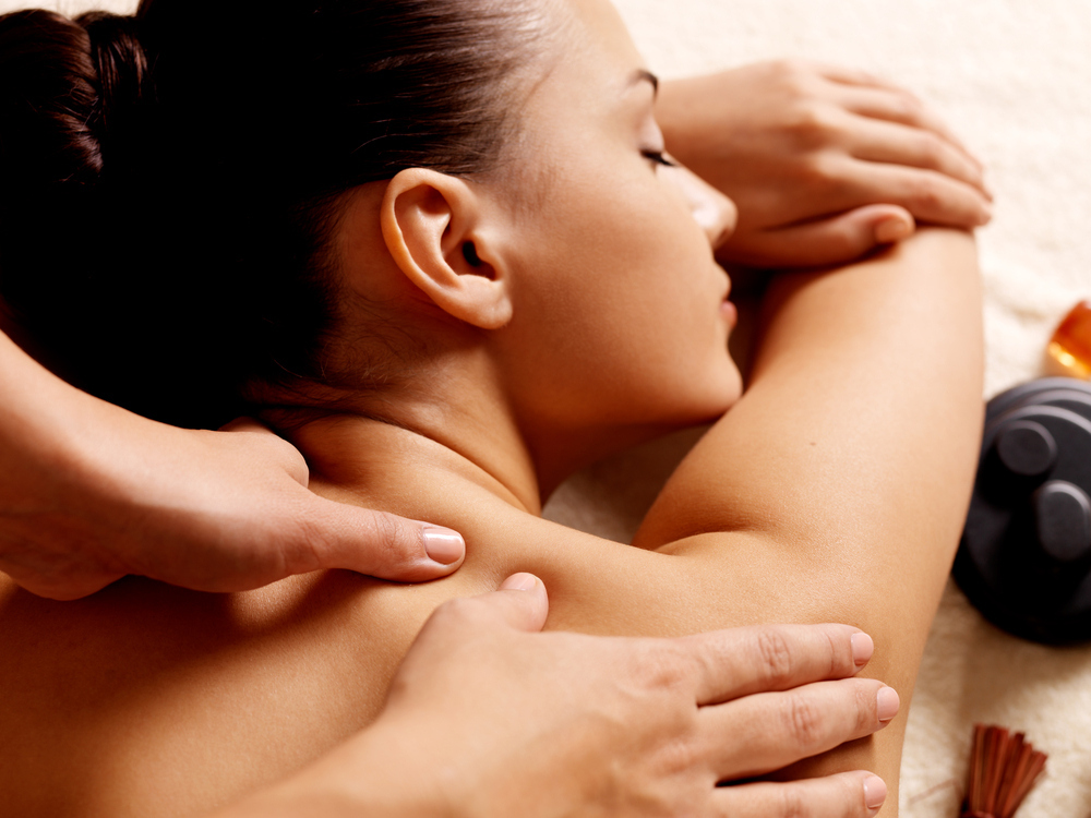 Your partner will appreciate it when you sneak up and give them a massage -- it reminds them that you're still attracted to them in more ways than one.