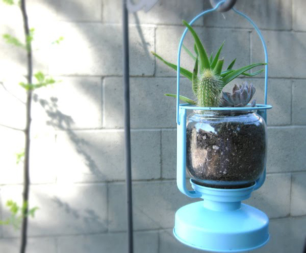 An IKEA lantern can become a planter.
